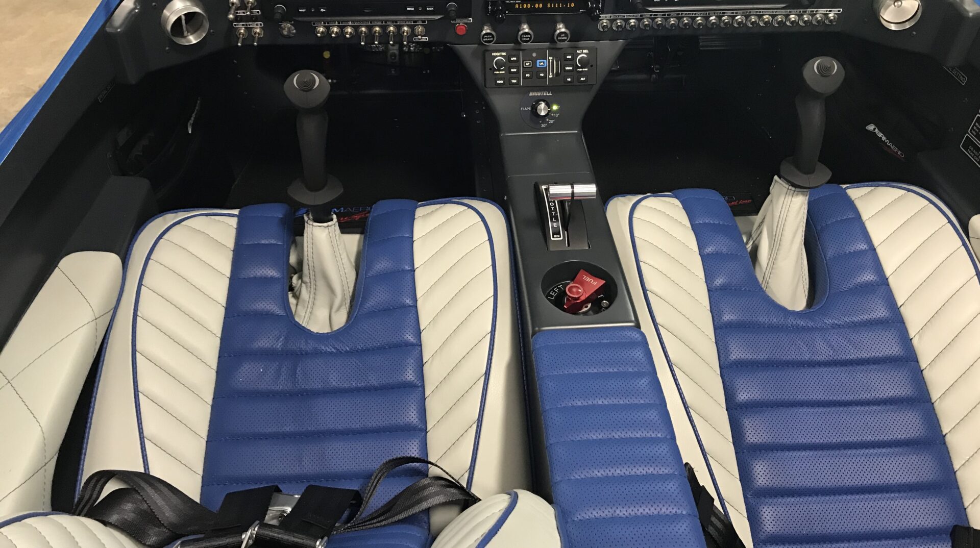 A view of the seats in an airplane.