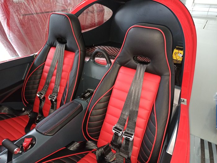 A red and black car with two seats